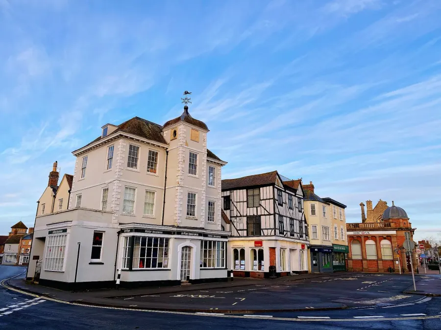 Market Square showing historical buildings and the famous fox weathervane, Bicester