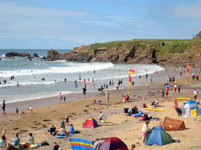 Crooklets Beach Bude A very popular surfing beach - busy on a mid-August day.
