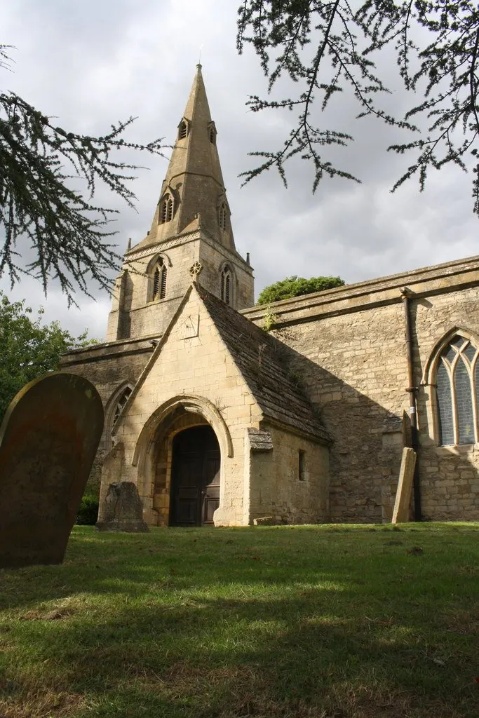 South face and spire of St John the Baptist Church , Corby