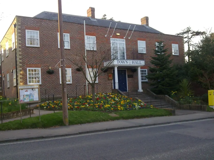Haywards Heath Town Hall. The yellow postbox is German, representing the twin town of Traunstein.