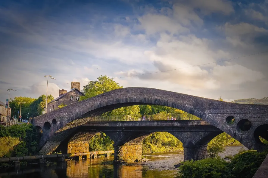 The Old Bridge (formerly New Bridge) in Pontypridd, south Wales, with the Victoria Bridge behind it.