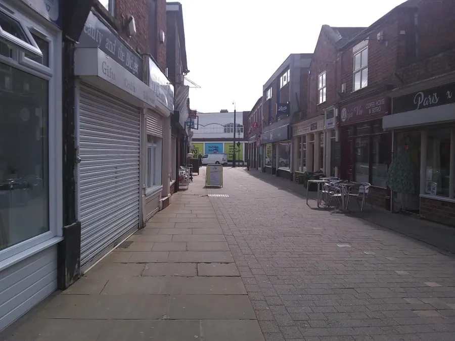 A photo of Finkle Street, Thorne, Doncaster taken in 2024. Most of the shops are open.