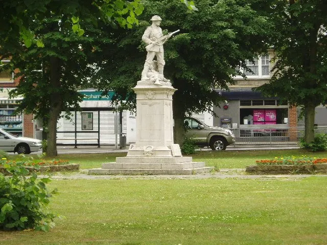 Warlingham - war memorial. Look closer and you will see that the soldier is guarding a woman and her child.